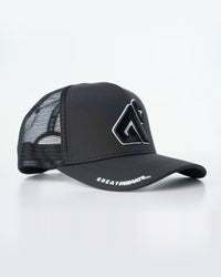 Black Primis Trucker Hat, three-quarter studio-product