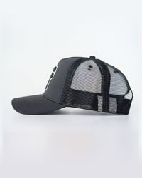 Black Primis Trucker Hat, side studio-product