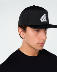 Black Primis Flat Brim Cap, three-quarter on-model